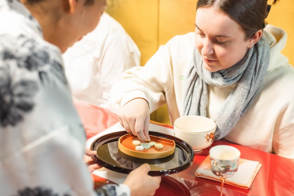 Kyoto: Table-Style Tea Ceremony at a Kyo-Machiya - Photo-Friendly Props: Umbrellas, Fans, and Sword-Style Drama