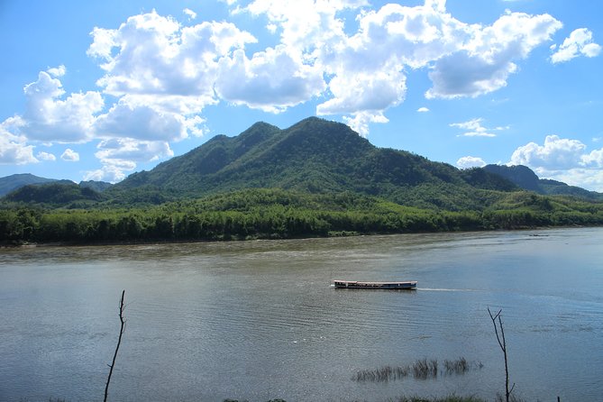 Luang Prabang: Cruise to Pak Ou Caves & Kuang Si Waterfalls - Pak Ou Caves by longboat: scenic time, then a quick cave visit
