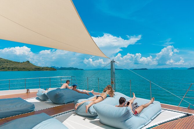 Luxury Boat to James Bond Islands with Lunch and Sunset Dinner - Onboard vibe: Wi-Fi, a DJ, and buffet meals that keep the day easy