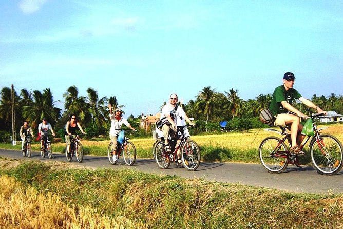 Mekong Delta 2-Day Tour: Floating Markets, Biking, Amazing Tour - Day 1 in Ben Tre and Tien Giang: boats, fruit orchards, and a major pagoda
