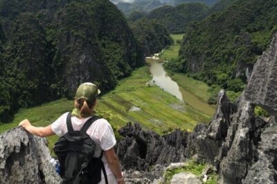 Ninh Binh Full-Day Small Group of 9 Guided Tour from Hanoi - Cycling through rice fields near the limestone mountains