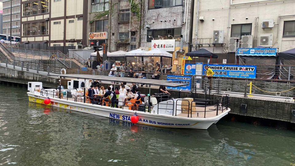 Osaka: Dotonbori District River Cruise with Drink Discount - Guide Energy, Music Volume, and Where to Sit