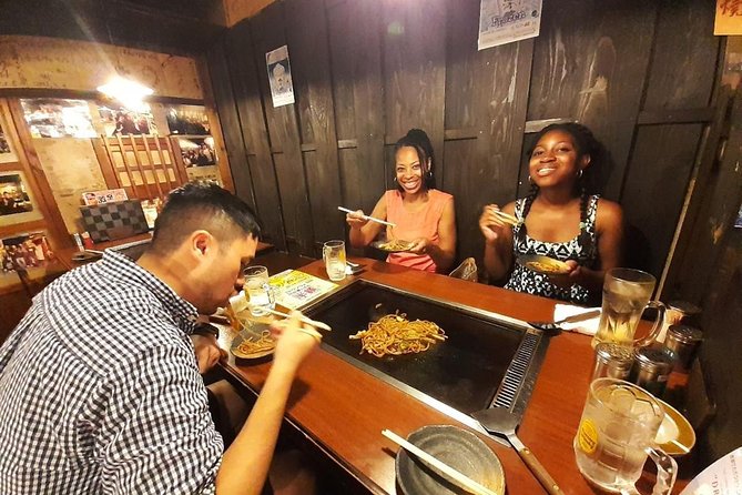 Osaka Local Foodie Walking Tour in Dotonbori and Shinsekai - Getting oriented: FamilyMart start and an easy finish at Glico