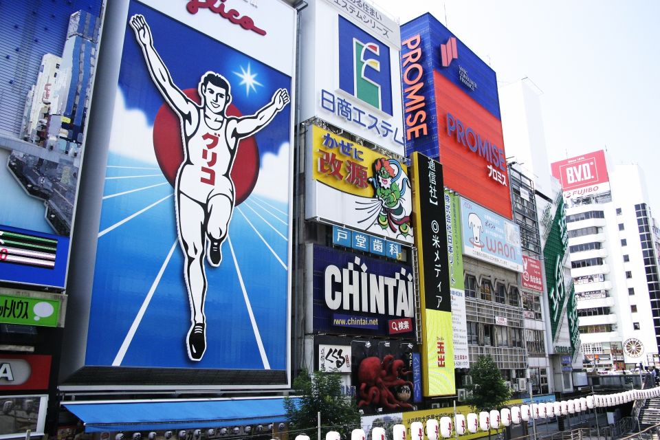 Osaka: Main Sights and Hidden Spots Guided Walking Tour - Namba and Dotonbori: shopping energy and the Osaka script