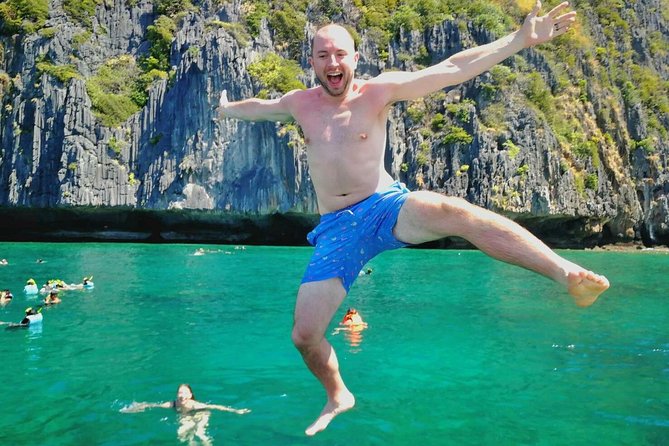 Phi Phi Early Bird & 4 Islands - Day Tour by Speedboat From Krabi - Monkey Beach: quick macaque spotting from the water