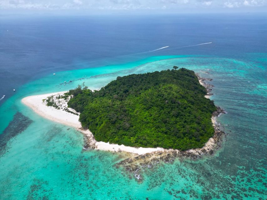 Phi Phi: Morning Speedboat Tour to Maya Bay with Snorkel - Meet-up at McDonald’s near Tonsai Pier and what the boat experience feels like