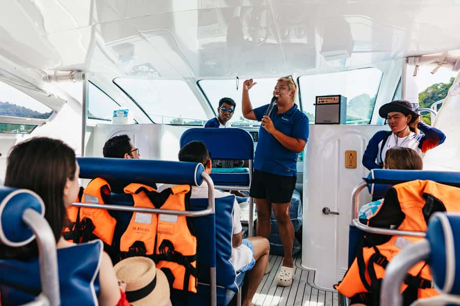Phuket: Phi Phi Islands Day-Trip by Speed Catamaran - Maiton Island and dolphins: the sunset gamble