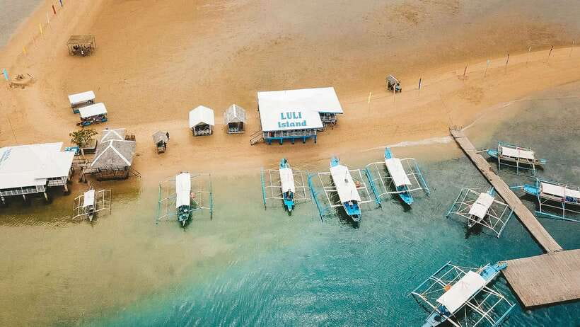 Puerto Princesa: Honda Bay Island Hopping & Optional Massage - Timing, group size, and the vibe on the boat