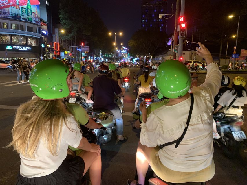 Saigon: Day-Night Sights & Local Food Tour l Female Option - A 3.5-hour motorbike food tour that mixes districts with real tastes