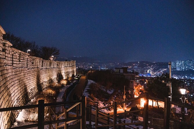 Seoul moonlight walking tour with local historian - Stop 5: Seoul City Wall at Night for the Skyline Finale