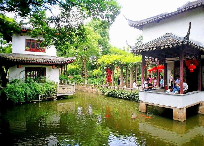 Shanghai: Zhujiajiao Private Tour w/ Boat Ride & Garden - Tallest Bridge Morning: Ming-Qing Details and Canal Views