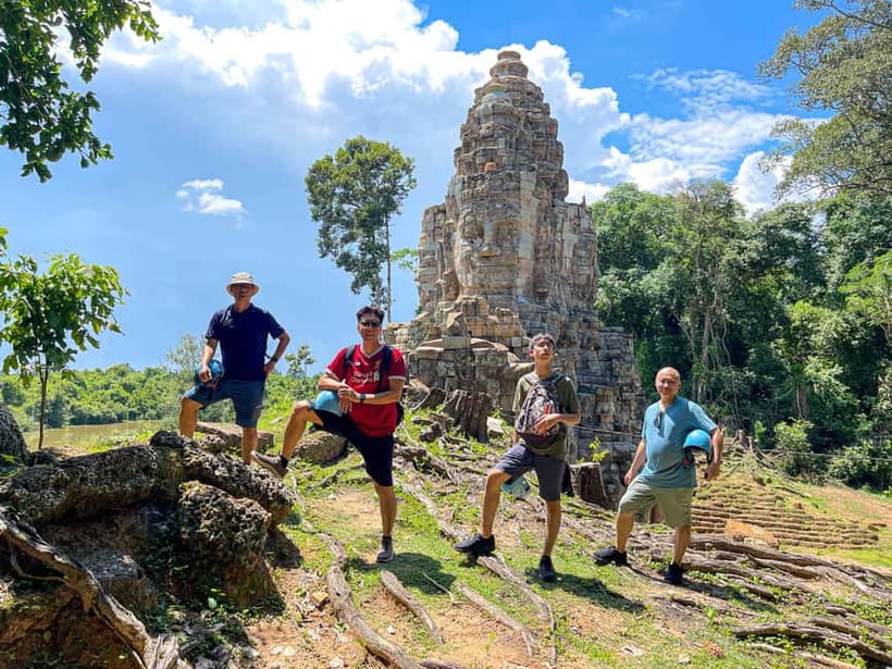 Siem Reap: Angkor Wat Sunrise Small Group tour and Breakfast - Victory Gate and Angkor Thom: the route that sets up Bayon