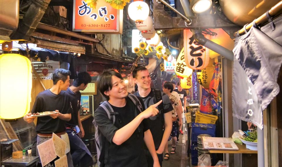 Tokyo: Shinjuku Bar Hopping with All-You-Can-Drink & Dinner - Meeting point: find the orange sign and start on time