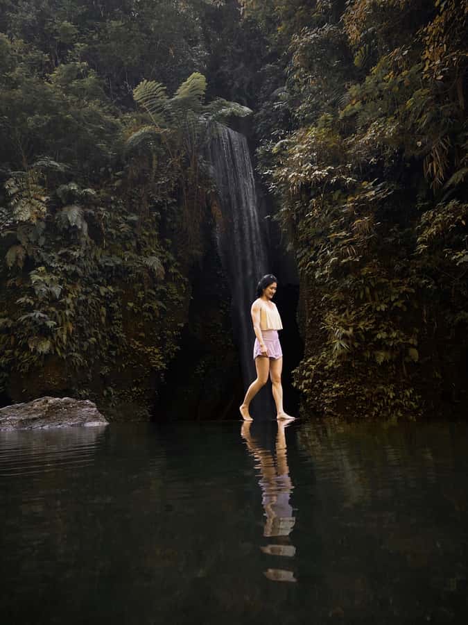 Ubud: Gorilla Face Quad Bike, Jungle Swing, Waterfall & Meal - Goa Raja Waterfall: canyon sun rays and that cave-like look